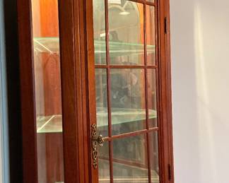 Pulaski Lighted corner curio cabinet 4 glass shelves $225