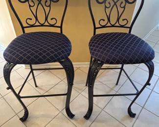 2 wood and iron barstools