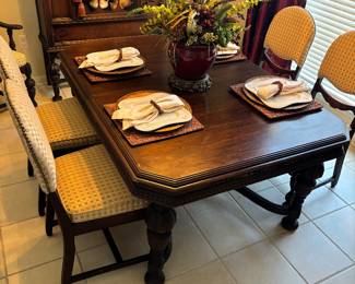 Antique dining table. 6 chairs. No leaf. Professionally reupholstered 