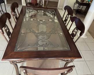 Large beautiful wood, iron and glass kitchen table. 6 chairs. No pets. No smoke