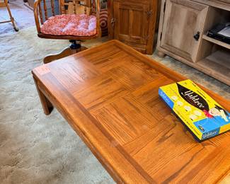 OAK COFFEE TABLE 50"W X 30"D X 16'H AND OAK CANE BACK DESK CHAIR
