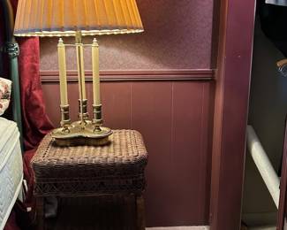 Brass lamp and wicker side table