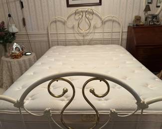 White metal queen bed with nice mattress set