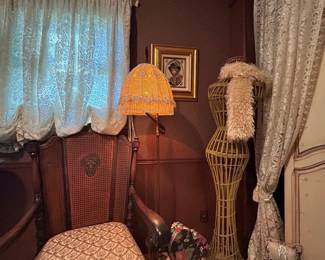 Antique floor lamp and wicker mannequin