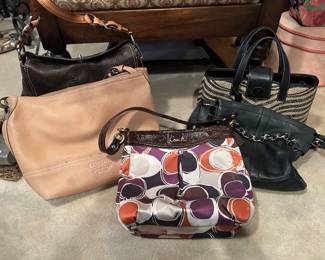 Several Coach purses