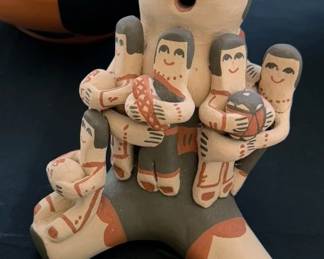 Storyteller ceramic doll