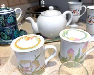 Assorted tea cups + pots