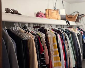 A variety of clothes and purses
