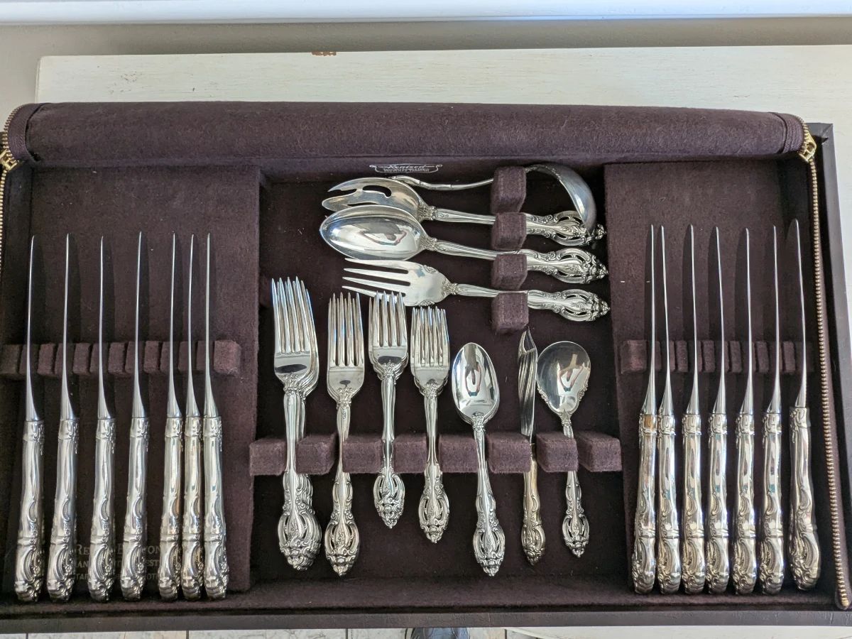 Lot 117: Gorham La Scala sterling silver flatware, service for 14 plus 6 serving pieces, 2,774 grams, fitted chest