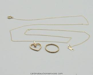 Lot 114: 14k gold chain with diamond heart pendant