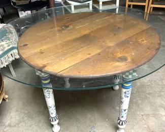 Heavy glass top on Mackenzie Child-style table~