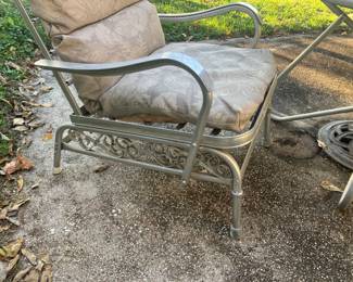 Aluminum scrolling under chair