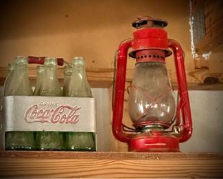 vintage Coca-Cola aluminum or metal six-pack bottle carrier and glass Coke bottles from around the 1940s to 1950s