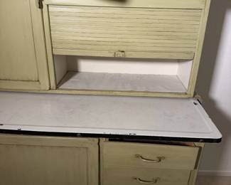 Enamel work surface and drawers on the Hoosier. They built them to last back then.