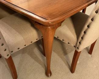 Graceful Queen Anne style legs under the dining table.