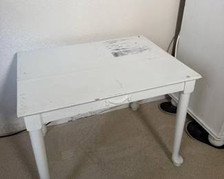 White writing desk with turned legs. Homework, crafts or a coffee station.