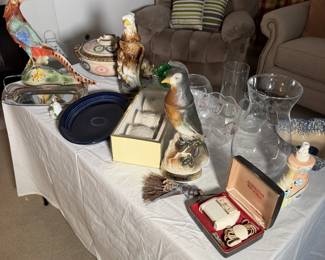 Bird figurines, collectible decanters, a vintage shaver in its case and glassware. Something for every collector.