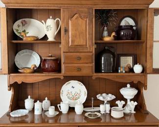 Maple hutch full of china, teapots, milk glass and pottery. Every shelf is a little treasure hunt.