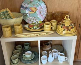 Sunny vintage pottery: bird platter, yellow mugs, lidded canister and green stoneware. Instant farmhouse kitchen.
