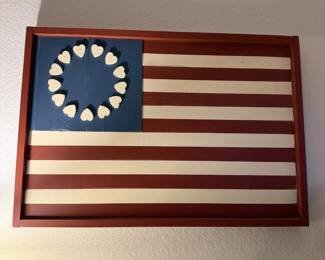 Americana flag wall art with a ring of heart stars. Perfect for the porch or a patriotic corner.