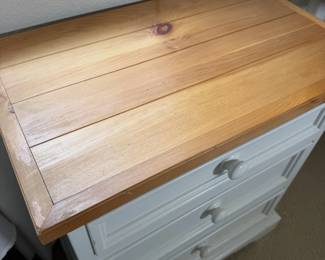 Pine plank top on the nightstand.