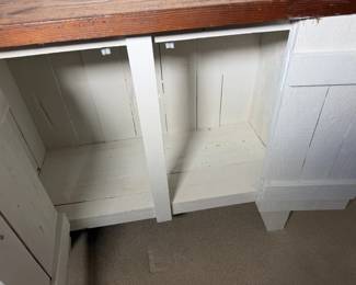 Open the doors and there is plenty of storage inside.