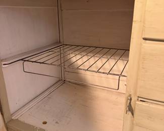 Lower Hoosier cabinet with wire pan rack. Pots and pans approved.