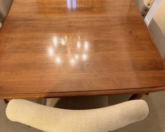 Warm wood tabletop with a shine you could check your lipstick in. Thanksgiving ready.