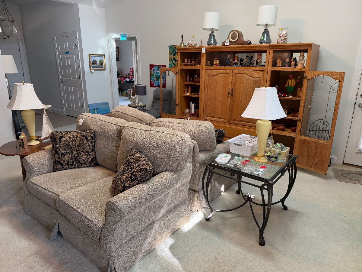 3 pc. oak entertainment cabinet, hand carved figures by the late Ed Kmoch, Clayton Marcus loveseats, lamps