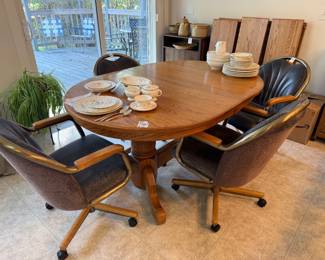 Oak dining table with SIX leaves, 4 swivel-tilt dining chairs by Chromecraft