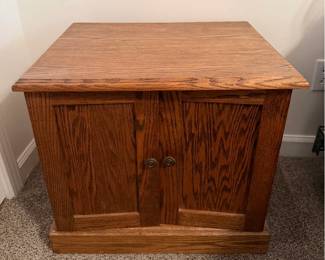 Lot 7312762: Traditional Oak Two-Door Storage Cabinet with Paneled Doors & Warm Wood Grain Finish