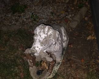 Large concrete dog statue