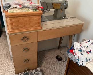Singer Sewing Machine in cabinet