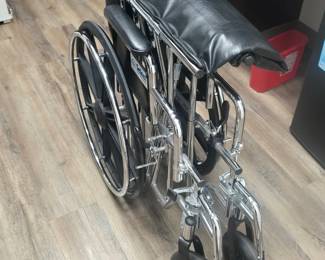 Wheelchair with leg rests$100.00
