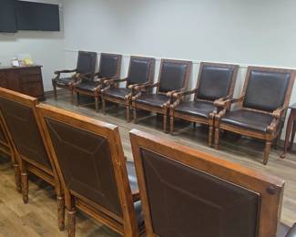 Large wooden waiting room chairs