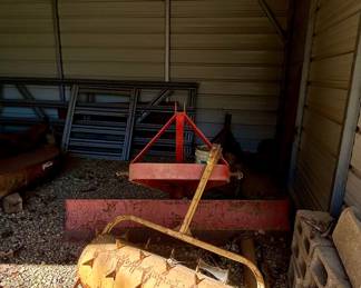 Rear Scraper Blade • Spiked Lawn Aerator