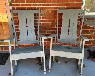 Pair of rustic wooden porch rocking chairs