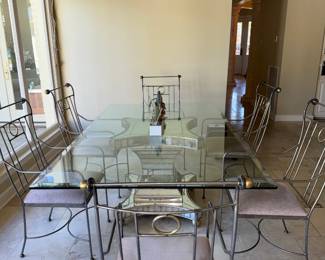 Beautiful glass top dining table with six chairs