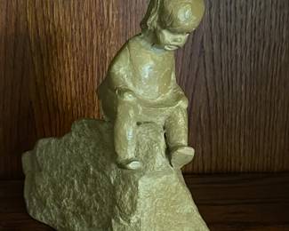 Haegar Pottery Figure Of Child On A Rock