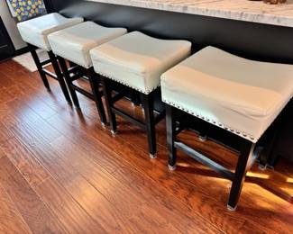 Four White Leather Barstools