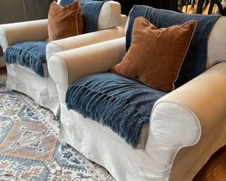 Restoration Hardware Off White Armchairs With Blue Chenille Blankets  Rust Colored Pillows