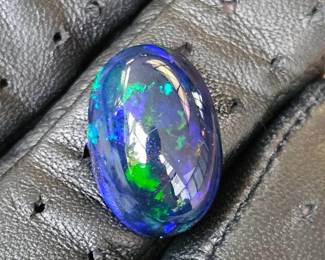 9.33 Carat Natural Ethiopian Welo Smoked Black Opal Oval Cabochon