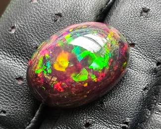 MASSIVE!! 22.92 Carat Black Opal Oval Cabochon