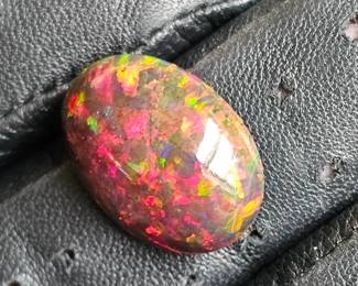 7.91 Carat Natural Ethiopian Welo Smoked Black Opal Oval Cabochon
