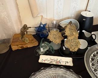 Vintage Bronze Sculpture of a Figure with Sunflower Motif