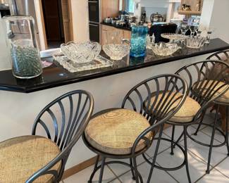 These barstools are built to last with metal fan backs and cushioned seats.