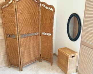 wicker room divider, sturdy but not heavy.