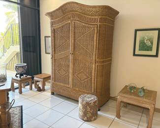 This armoire is incredible. Light, but sturdy, it's about 7 feet tall. That's a lot of storage and a statement piece in one!