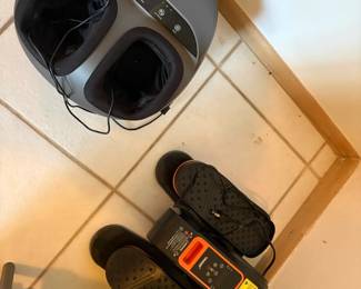 under desk eliptical, right, foot massager, left.