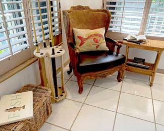 Fantastic wicker, leather and wood arm chair. Kick back and read some Zane Gray!